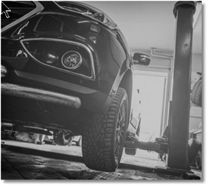 Car on a Hoist during repairs